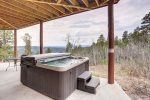 Eagle Trail Lodge deck with hot tub. 